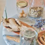Herbal Medicine - clear glass jar with white powder inside