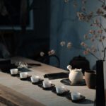 Japanese Tea - white flowers on black ceramic vase