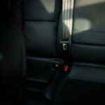 Safety Tips - black leather car seat with seat belt