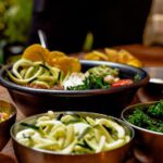 Vegan Restaurant - green vegetable dish on brown ceramic bowl